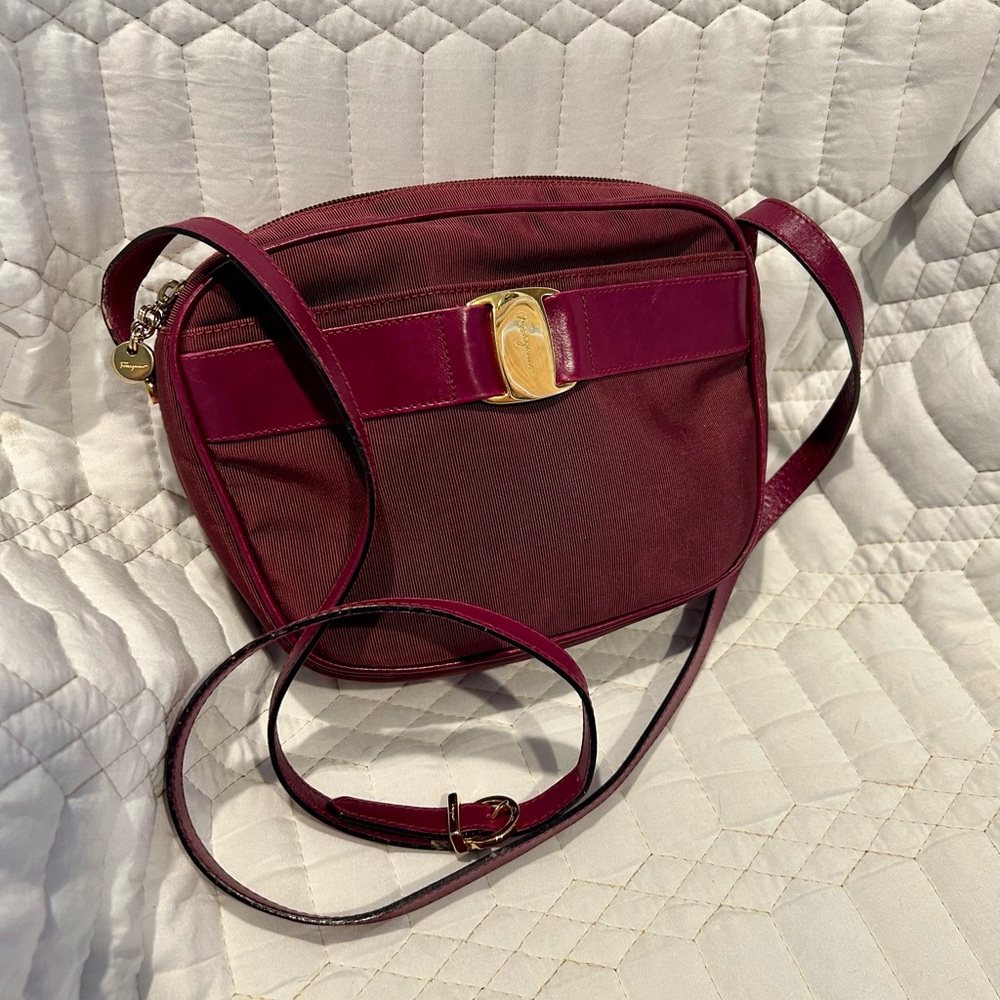 Salvatore Ferragamo Burgundy Crossbody Bag with Gold Accent